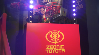 This <i>Gundam-</i>Themed Toyota Has Its Own Costumed DJ For Auto Shows